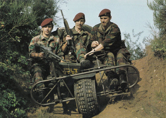 Belgian Soldiers wearing jigsaw camouflage camo, front aspect of them driving